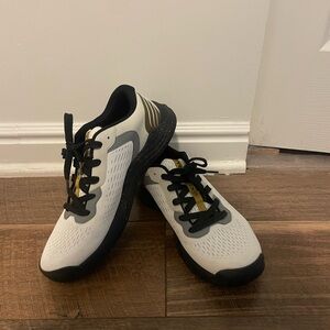 White and Black TYR CXT-1 Trainers with Gold Accents